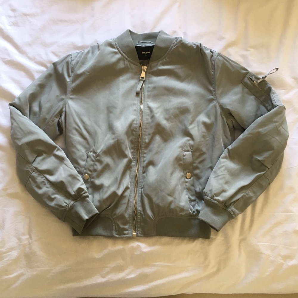 greyish-teal bomber jacket